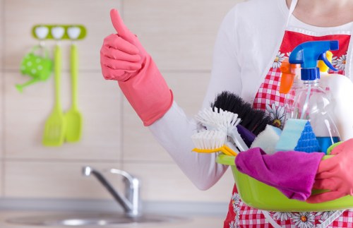 Office cleaner in Hounslow maintaining a tidy commercial workspace