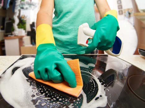 Carpet cleaning team preparing equipment with health and safety checks
